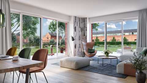 Helles Wohnzimmer mit großen Fenstern, moderner Einrichtung und Gartenblick.