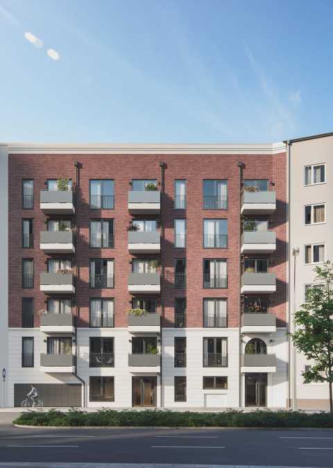 Modernes Wohnhaus mit roten Ziegeln, Balkonen und Straßenansicht bei Sonne.