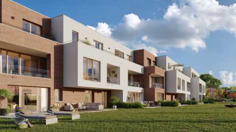 Moderne Wohnanlage mit großen Fenstern, Balkonen und gepflegtem Gartenbereich.