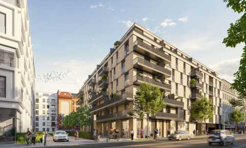 Moderne Wohnhäuser mit Balkonen, Bäumen und Menschen in einer Stadtstraße.