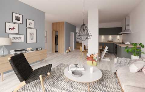 Helles Wohnzimmer mit moderner Einrichtung, offener Küche und Kinderspielsachen.